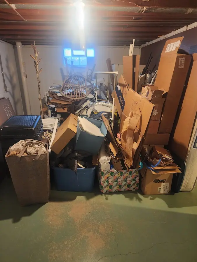 Roll-off dumpster container at job site for Yard Waste Dumpster Rental in Glasgow